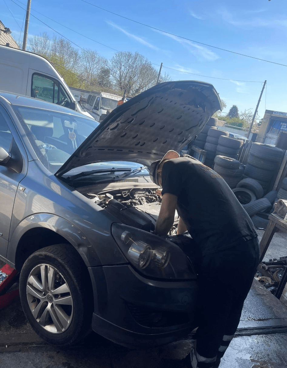 Mechanic working on a car